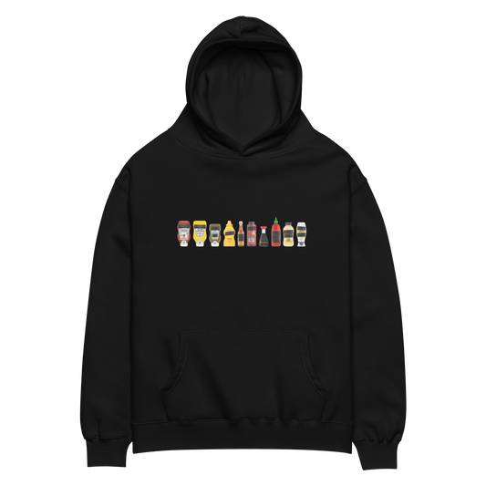 Black oversized FPOTBD pullover hoodie with Censored Condiments 1.0 bottles graphic print on chest.